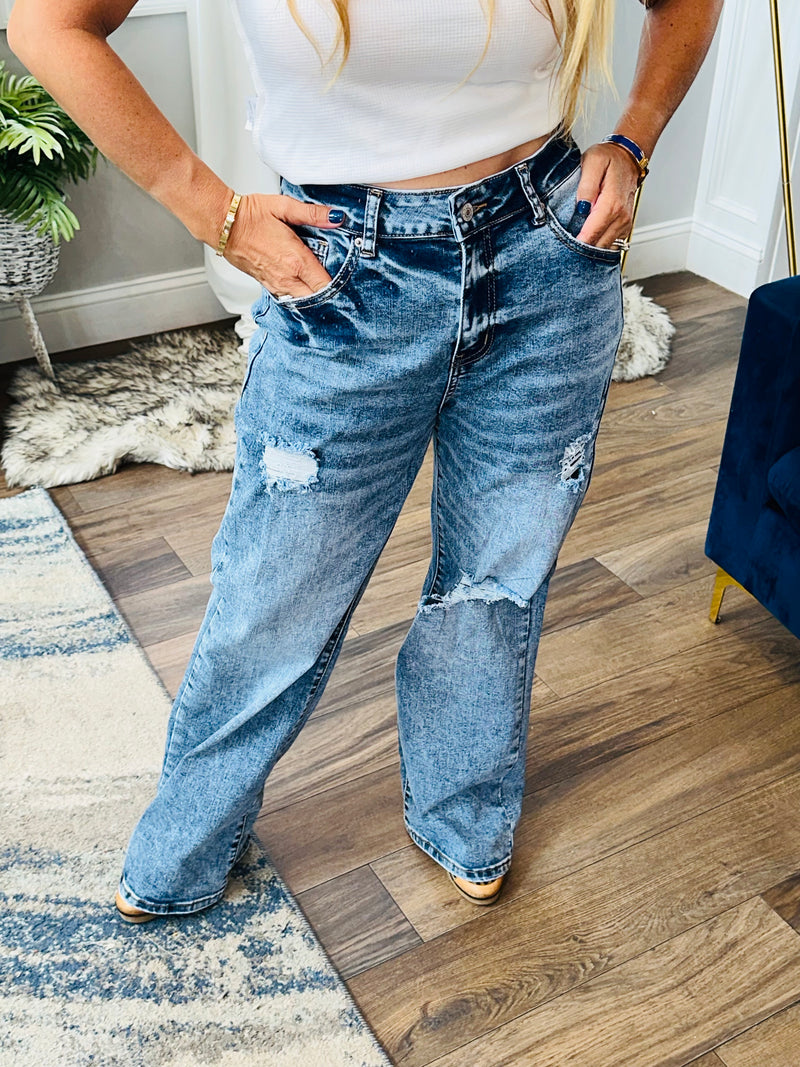 High waisted distressed washed jeans