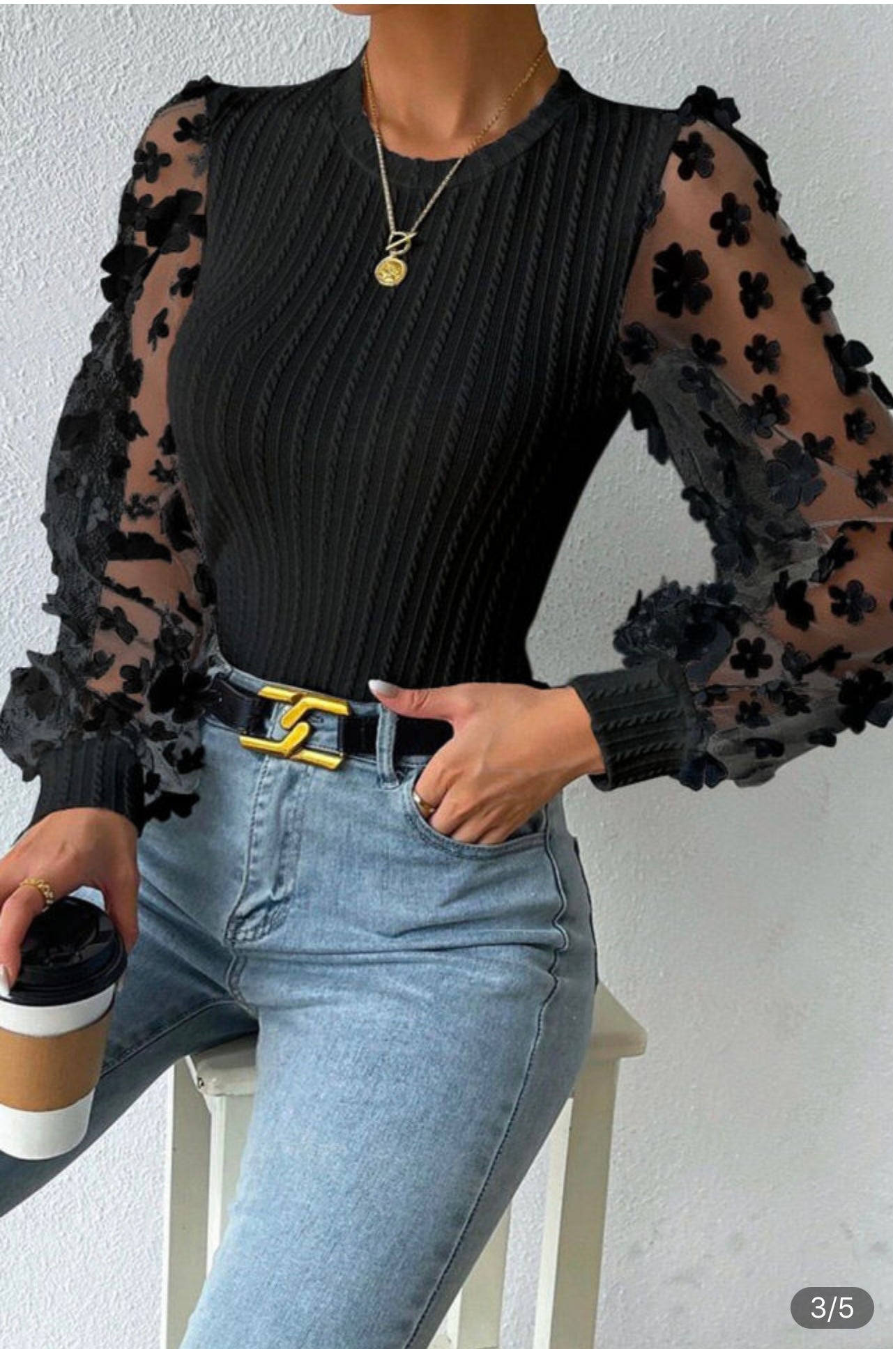 Floral appliqué top