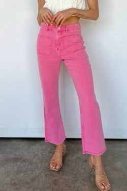 Flare leg pink jeans with raw hem