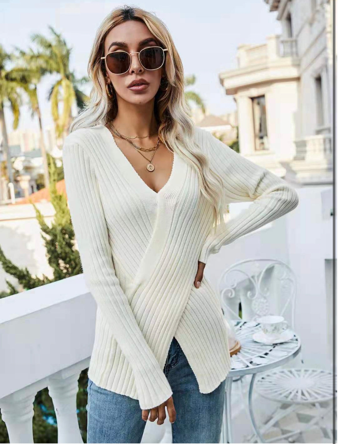 Ripped long sleeve criss cross top